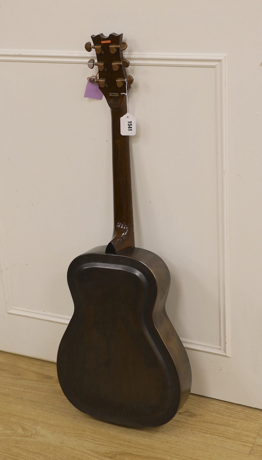 A Dean Resonator Heirloom guitar, bronzed finish, with soft case, 100cms high.